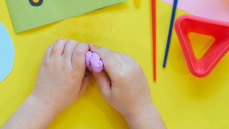 School supplies, stationery on yellow background - space for caption. Child ready to draw with...