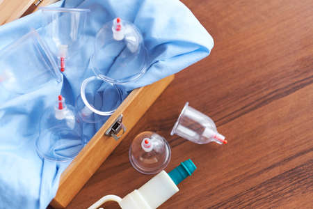 Vacuum therapy. Cup massage. Hijama. traditional Chinese medicine clinic indoor. medical and health concept.の写真素材
