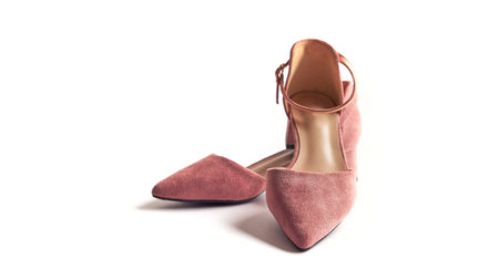beige mules on a white background, female shoes. front view
