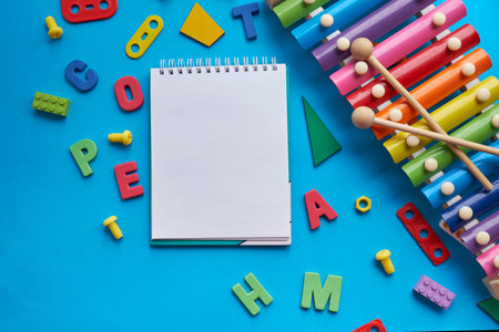 School supplies, stationery on blue background space for caption. Back to school concept. School,...