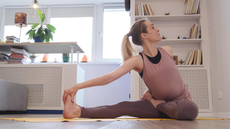 Woman meditating. young woman doing yoga exercise at home for stress relief relaxing from work.