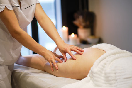 masseur makes anticellulite massage young woman in the spa salon. Body care concept. Special anticellulite treatment.の写真素材