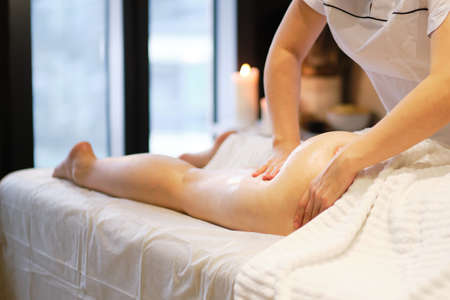 masseur makes anticellulite massage young woman in the spa salon. Body care concept. Special anticellulite treatment.の写真素材