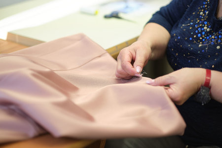 Tailor atelier handmade exclusive clothes making and repair, private business, creative occupation...