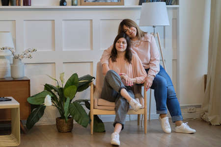 mother and adult daughter in the park, family portraitの写真素材