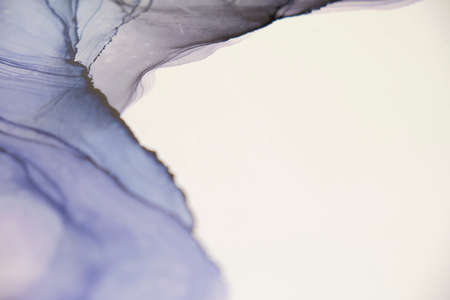 Blue abstract art background texture in white. delicate stains of paint on white paper. soft focusの写真素材