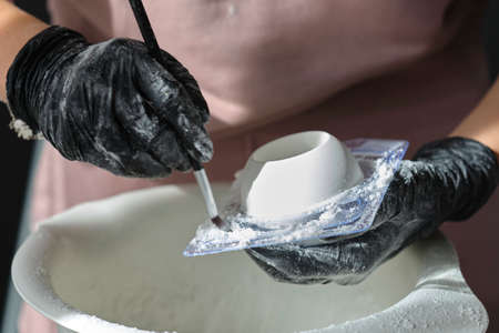 handmade bath bombs process. Preparation of bath bombs. Ingredients and floral decor on a wooden vintage table.の写真素材