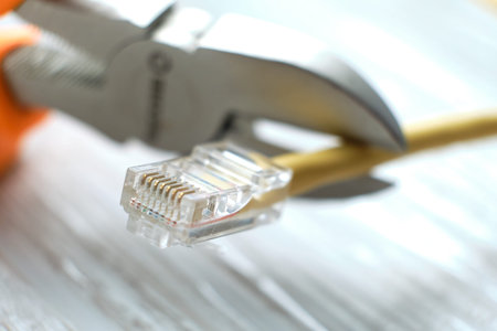internet or telephone line cables and crimper. Concept of network troubleshoot supporter or...