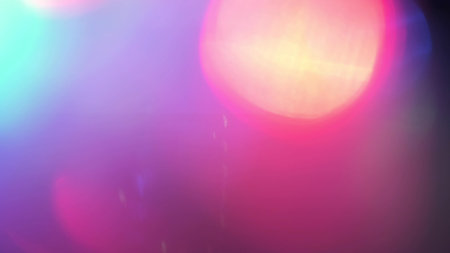 abstract night background. Color light overlay. Disco illumination. Defocused blue pink green...