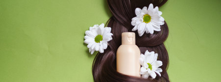 sustainable and cruelty-free products nourish and revitalize your hair and scalp, leaving you with healthy, radiant locks. Natures beauty of hair adorned with ferns and daisies.の写真素材