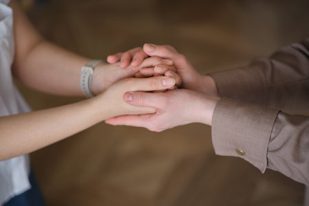 emotional image that reflects the struggles faced by victims of domestic abuse or violence. charities and organizations working to provide support and safety for those affected.の写真素材