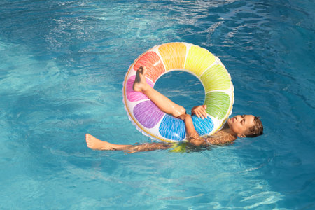 Tiny Explorer, Big Chill: A pool serves as a sanctuary for a little boy who s enjoying his voyage on...