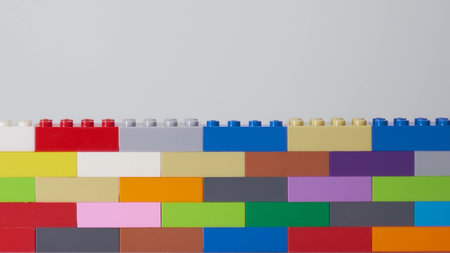 plastic building block. plastic brick wall. Wall from Plastic building blocks isolated. Suitable for...