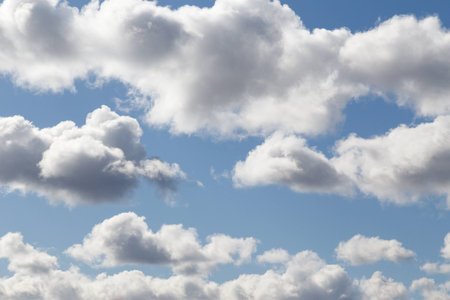 Fluffy clouds under the blue sky floatの写真素材