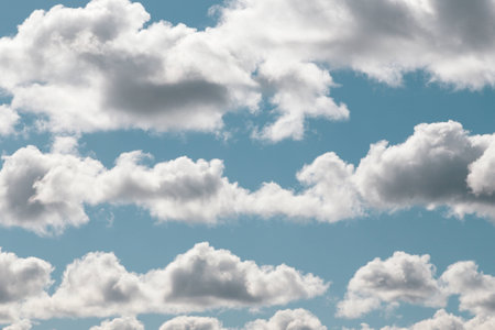Fluffy clouds under the blue sky floatの写真素材