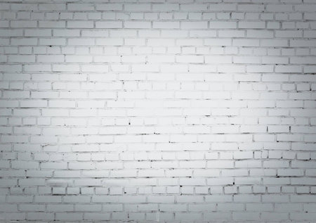 Background of white brick wall with vignettingの写真素材