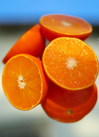 Juicy mandarines with self reflection