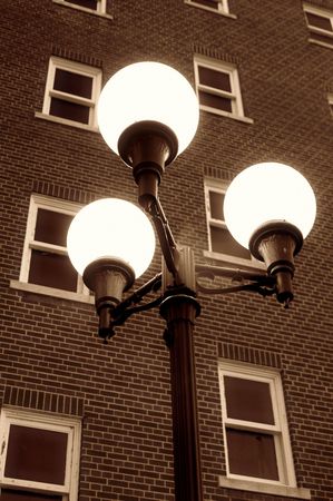 Streetlamps and old building, vintage treatment.の写真素材