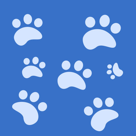 cat paw pattern on blue backgroundのイラスト素材
