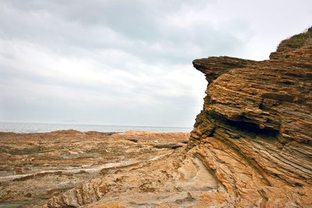 Extrude Cliff under cloudy dayの写真素材