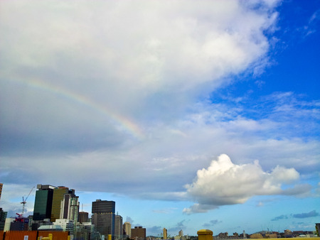 Rainbow with blue sky in Brisbaneの写真素材