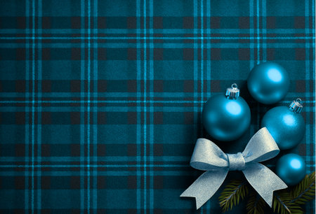 Christmas background with blue baubles on checkered tableclothの素材