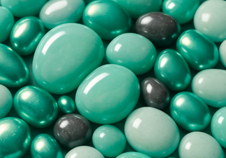 Close up of green and black dragee candies. Toned.の素材