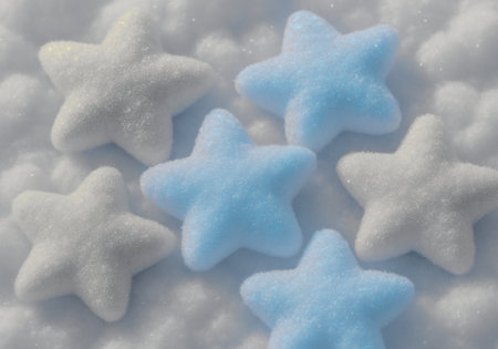 Blue and white christmas stars on white snow background, copy spaceの素材