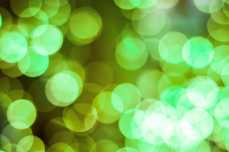 green bokeh abstract light background for christmas and new yearのeditorial素材
