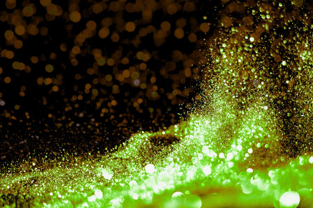 golden glitter vintage lights background. gold and black. de focused