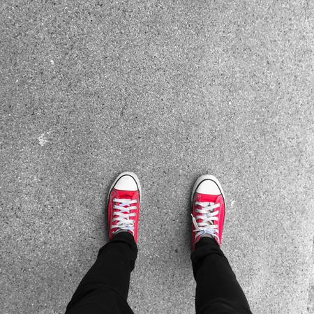 Selfie of sneakers on the road great for any use.の写真素材
