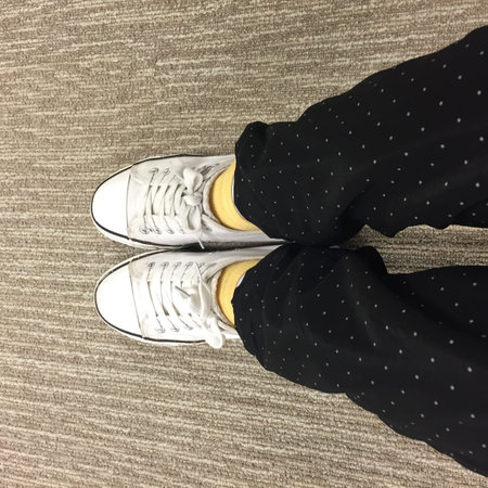 White Sneakers shoes walking on ground