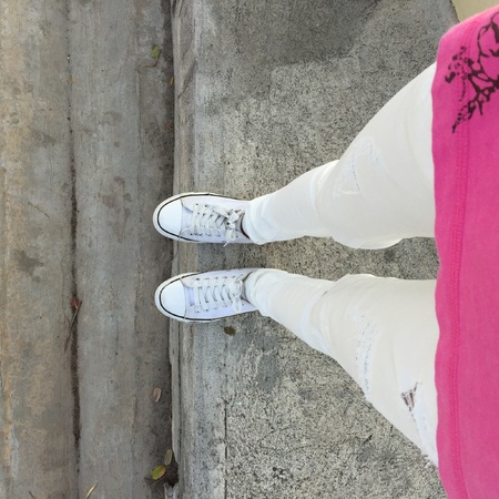 White Sneakers shoes walking on groundの素材