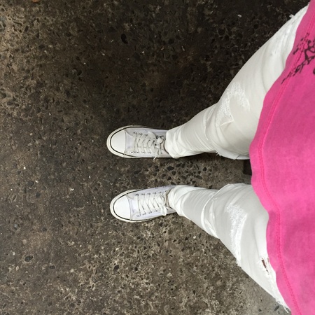 White Sneakers shoes walking on groundの素材