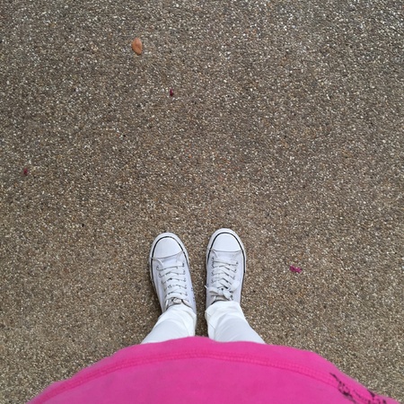 White Sneakers shoes walking on groundの素材