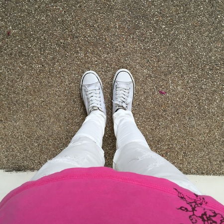 White Sneakers shoes walking on groundの素材