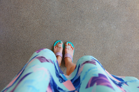 Female Legs in Fashion Shoes. Isolated on Floor Background Great For Any Use.の写真素材