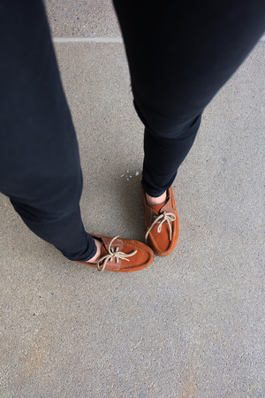 Close Up of Female Brown Shoes. Outdoor Fashion Shoes Footwear Concept Great For Any Use.の写真素材