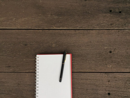 Blank Notebook With Pen On Wooden Desk, Business Concept Great For Any Use.の写真素材