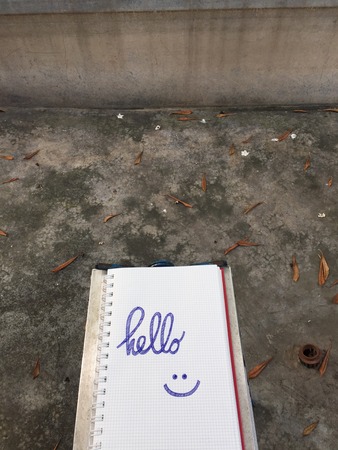 Top View Notebook Writing âHelloâ on Staircase Background Great For Any Use.の写真素材