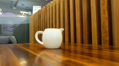 Fresh Milk in Jug (Pitcher) on Wooden Background Great for Any Use.の写真素材
