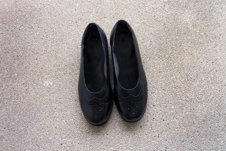 Close Up Fashion Black Shoes for Female on Floor Background Great For Any Use.の写真素材