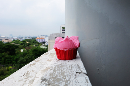 Steamed Cup Cake with Red Paper, Thai Dessert on Building View Background Great For Any Use.の写真素材