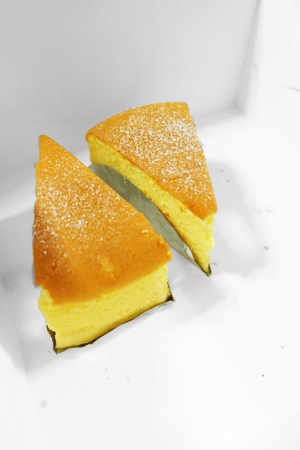 Couple Butter Cake, Slice of Soft Cake Isolated on White Backgroundの写真素材