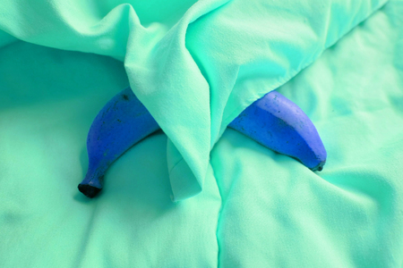 Blue Banana, Close Up Banana Fruit on Green Background Great For Any Use.の写真素材