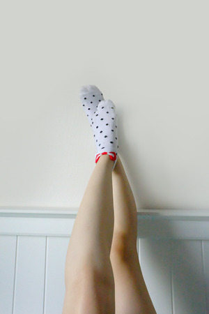 Polka Sock. Selfie Legs and Feet Wear White Socks with Polka Dot Background Great For Any Use.の写真素材