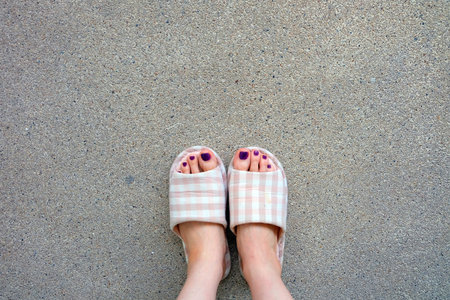 Checkered Slippers, Selfie Womanâ€™s Pink Home Slippers Feet (Nail polish) on Concrete...