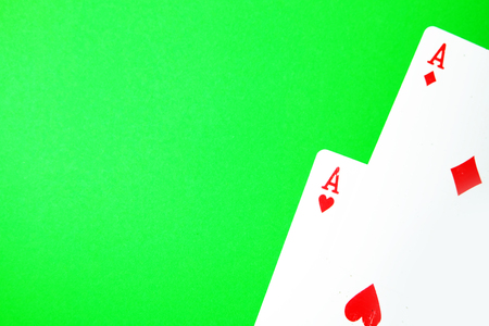 Two of Spades and Diamonds Playing card. Ace Playing cards isolated On Green Background Great for Any Use.の写真素材