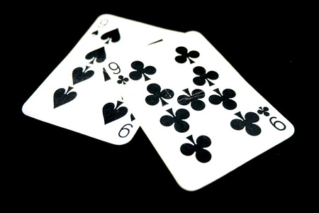 Two of Nine Playing Card for Gambler. Old Playing Cards Nine of Clubs Isolated On Black Background Great for Any Use.の写真素材