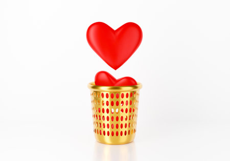 3d red heart falling in garbage bin, trash can or gold basket. Conceptual with break up or broken heart. 3d render for valentines day. Fake love isolated on white background. Creative idea minimal.の写真素材